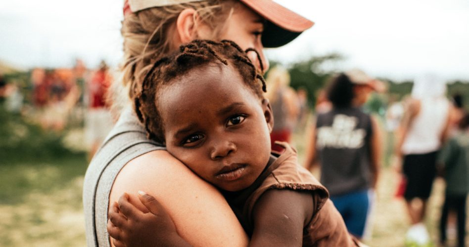 Girl hugging a child, Finding Your Place to Serve in Missions
